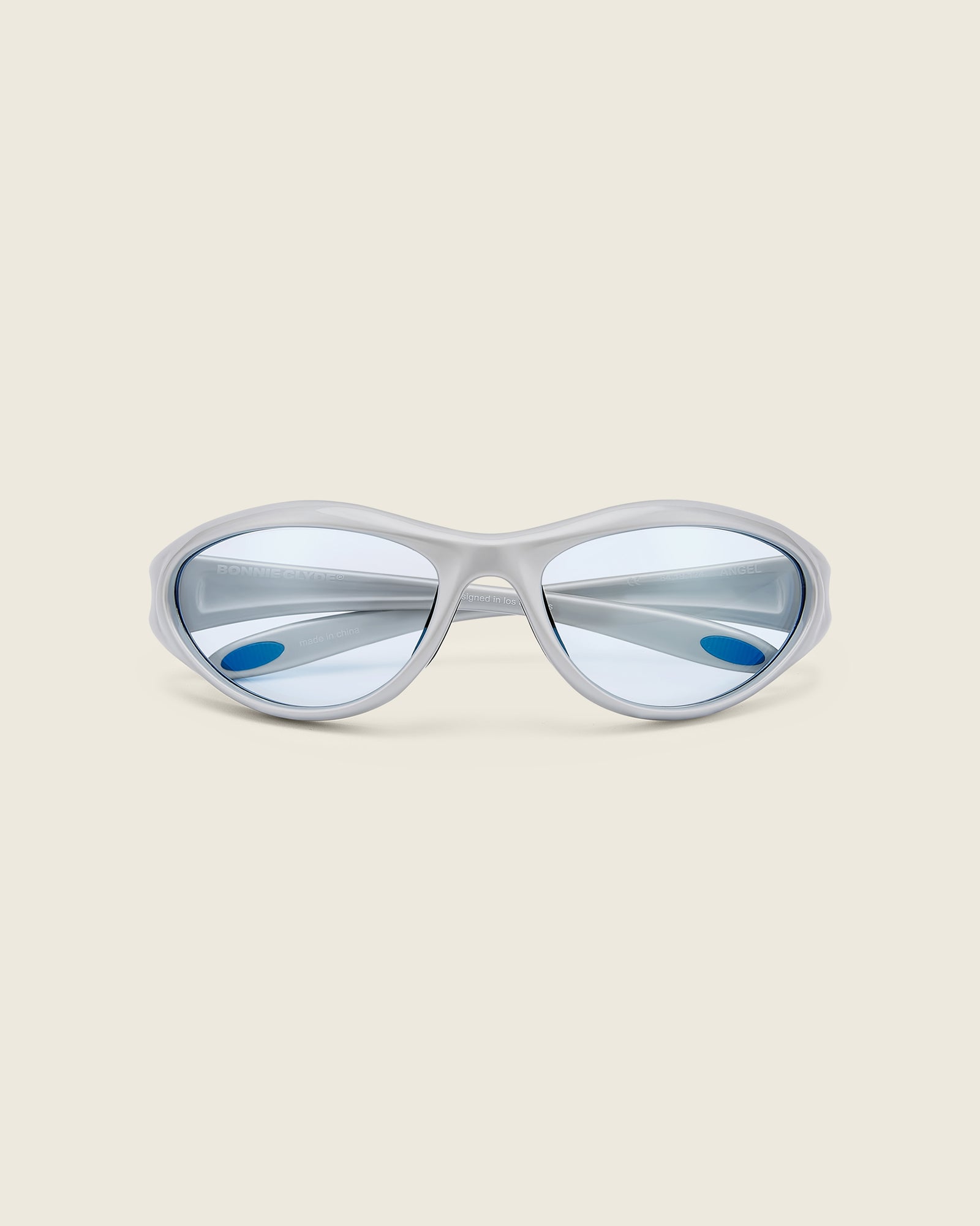 Bonnie Clyde Angel aviator opticals in silver TR90 with blue lenses, face view.