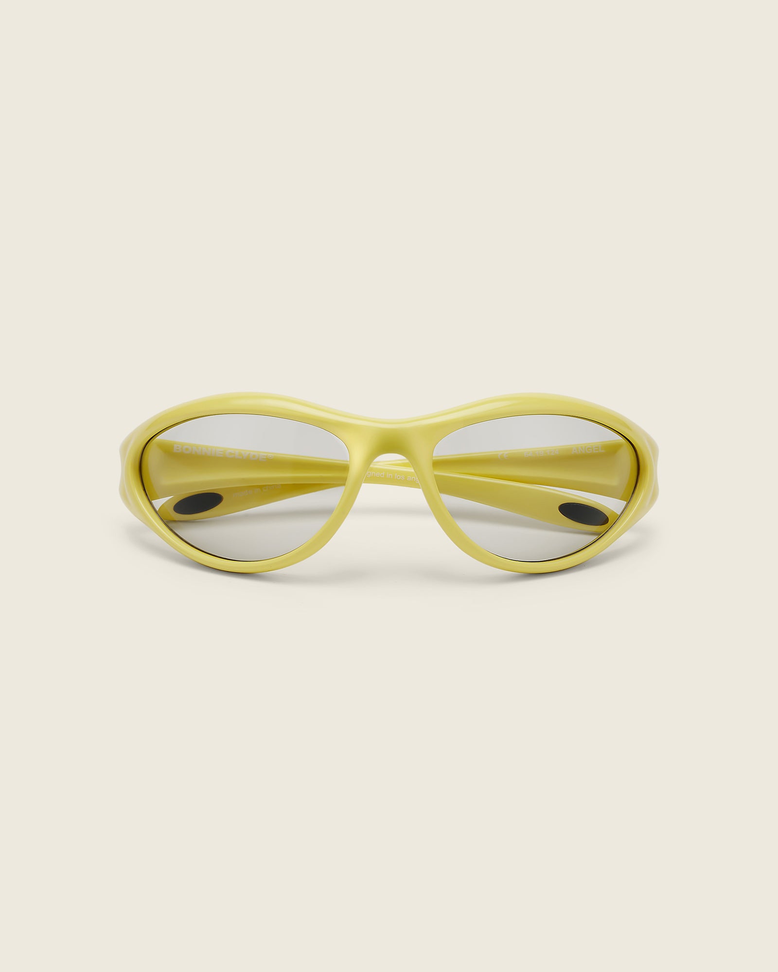 Bonnie Clyde Angel aviator opticals in yellow TR90 with grey lenses, face view.