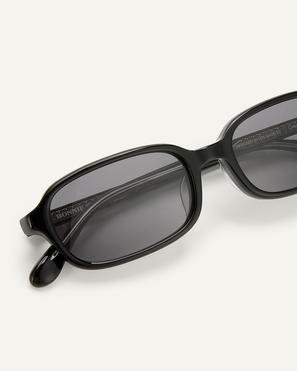 Close-up shot of Bonnie Clyde Comedy sunglasses in black.