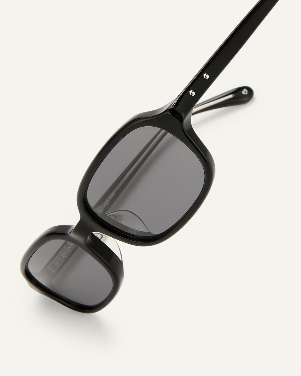 Side shot of Bonnie Clyde Comedy sunglasses in black.