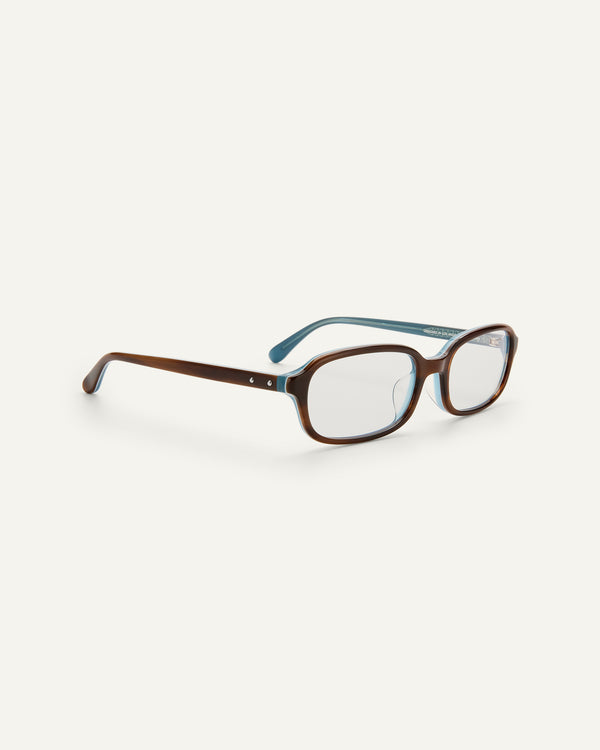Quarter shot of Bonnie Clyde Comedy optical in teal demi.