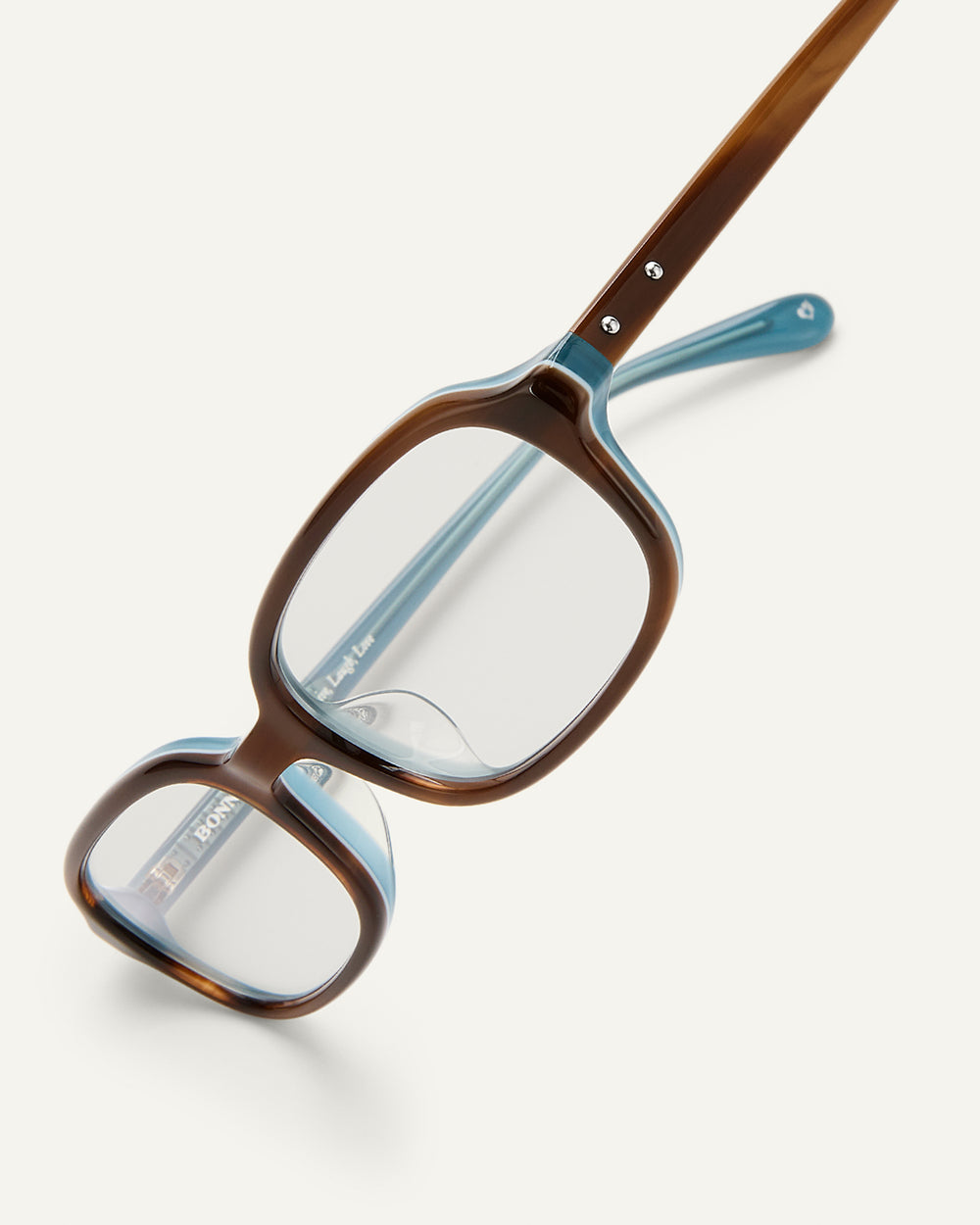 Side shot of Bonnie Clyde Comedy optical in teal demi.