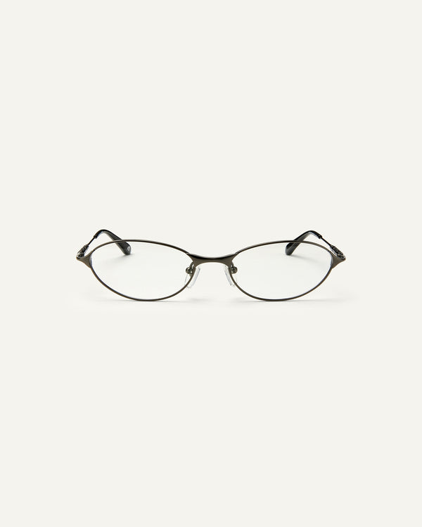 Face shot of Bonnie Clyde Intro eyeglasses in gunmetal titanium frames with black acetate details and clear lenses.