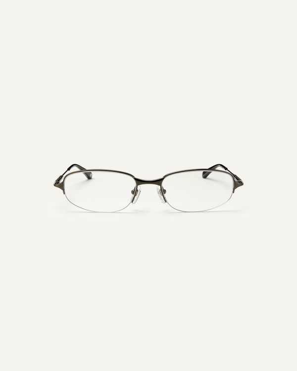 Face shot of Bonnie Clyde Outro eyeglasses in gunmetal titanium frames with black acetate details and clear lenses.